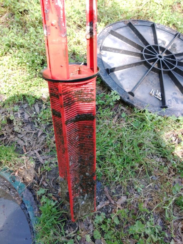 Filter before cleaning - see how it's stopped up and water cannot flow through freely?